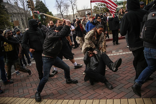 Violence breaks out between the supporters of President Donald Trump Trump and anti-Trump protesters during a free speech rally in Berkeley, Calif., on March 4, 2017. (Joel Angel Juarez/Anadolu Agency/Getty Images)